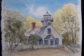 A watercolor painting of Old Mission Point Lighthouse in summer, with the lighthouse depicted amidst trees and soft sunlight illuminating the scene.